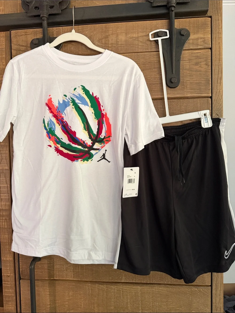 Nike youth Black Athletic Shorts with White Stripe and matching Jordan tshirt